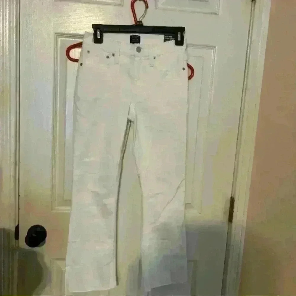 J Crew white denim size 25 mid‎ rise raw hem. New